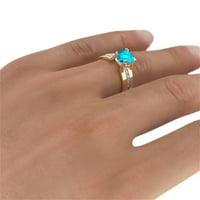 Plavi topaz prsten od 4 karata s dijamantima od žutog zlata od 14 karata